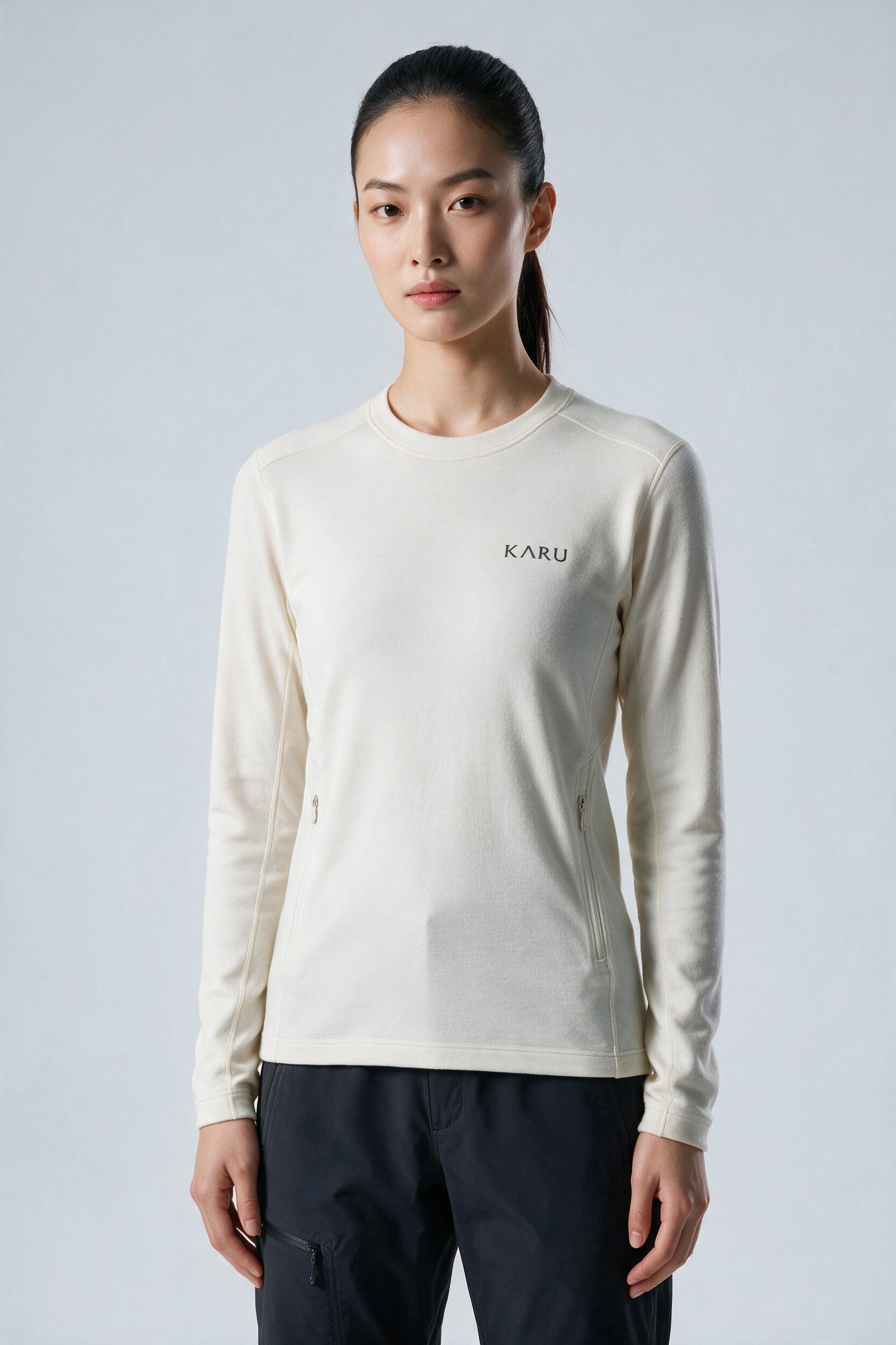 Abisko Crew in bone, worn by a model, studio product shot on a seamless neutral ground