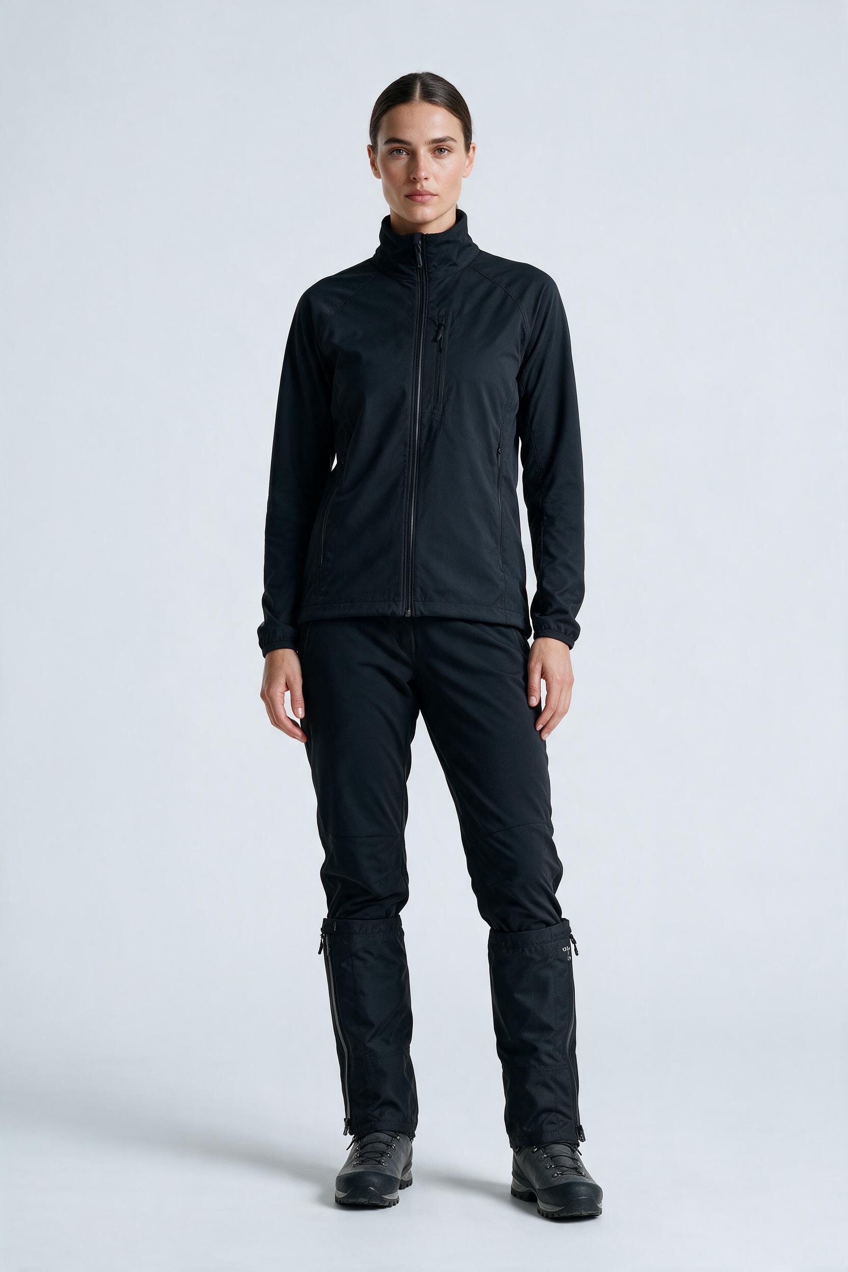 Halti Gaiter in night black, worn by a model, studio product shot on a seamless neutral ground