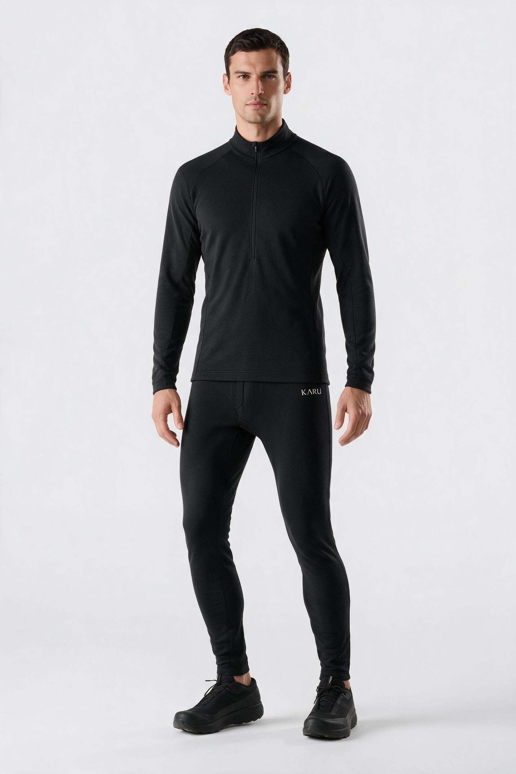 Kaise Tight in night black, worn by a model, studio product shot on a seamless neutral ground