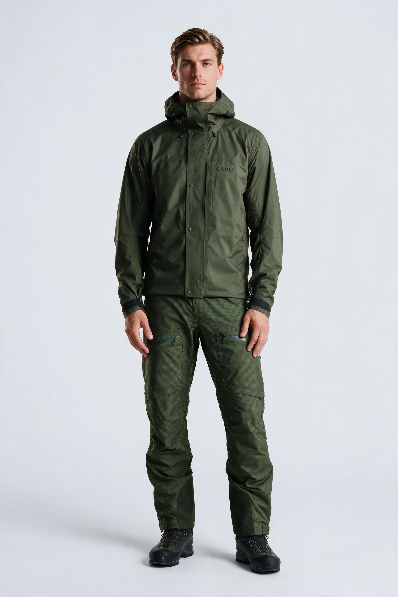 Padjelanta Pant in deep moss, worn by a model, studio product shot on a seamless neutral ground