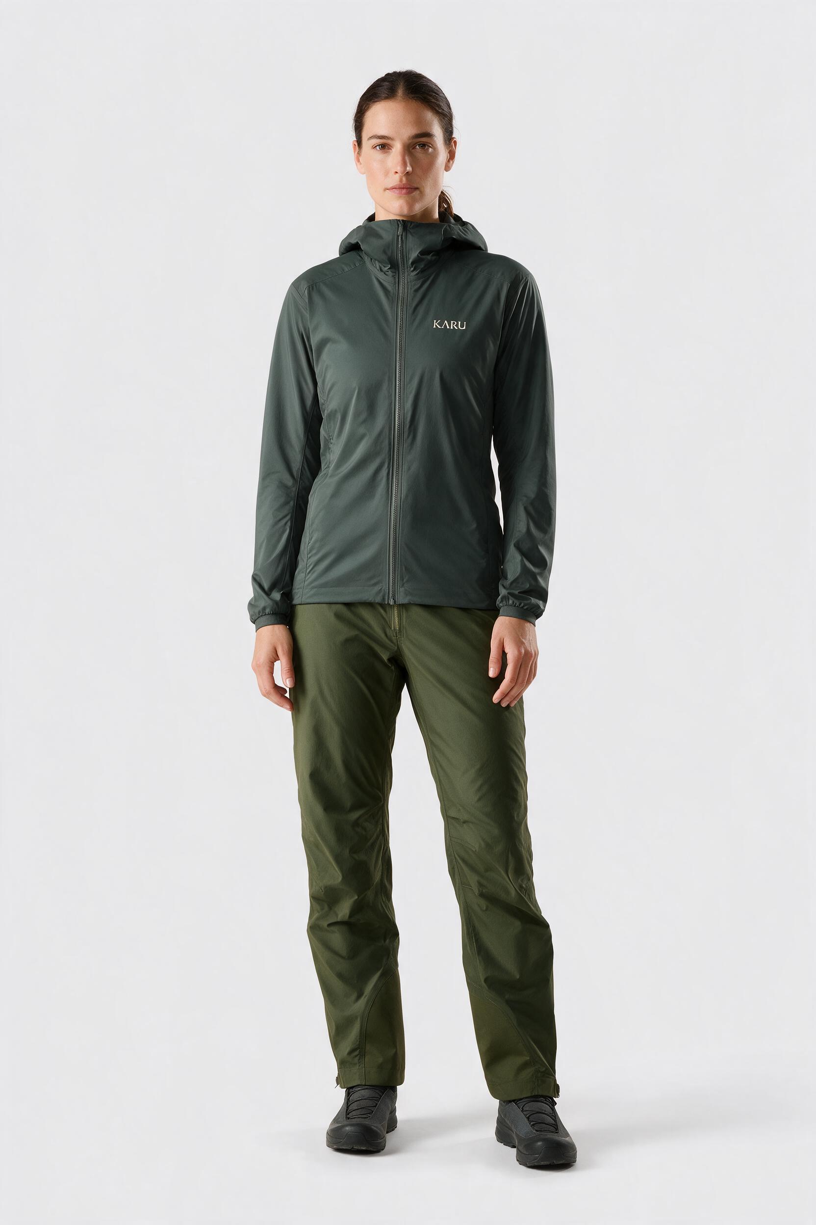 Padjelanta Pant in deep moss, worn by a model, studio product shot on a seamless neutral ground