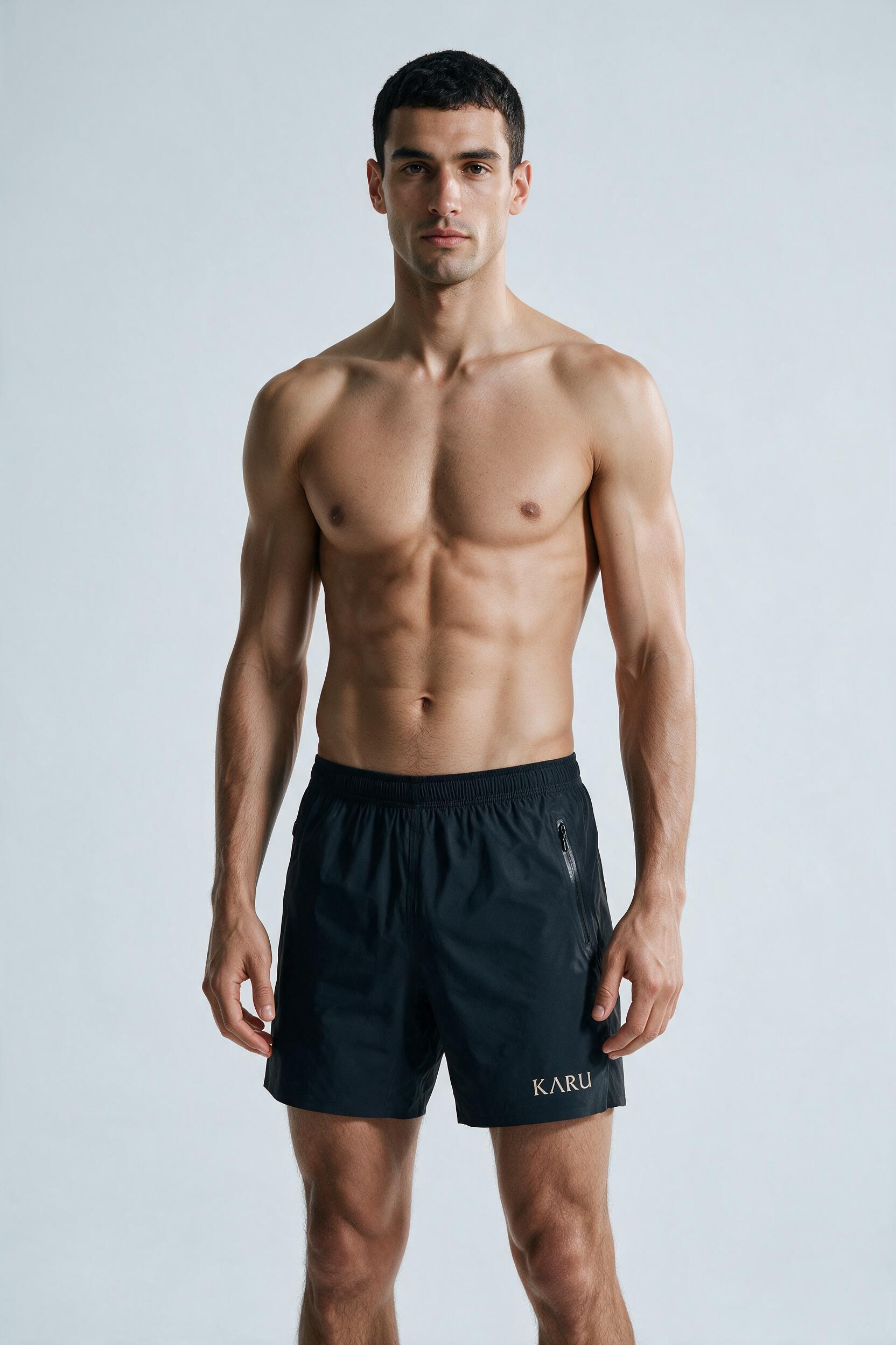 Rissa Short in near-black, worn by a model, studio product shot on a seamless neutral ground