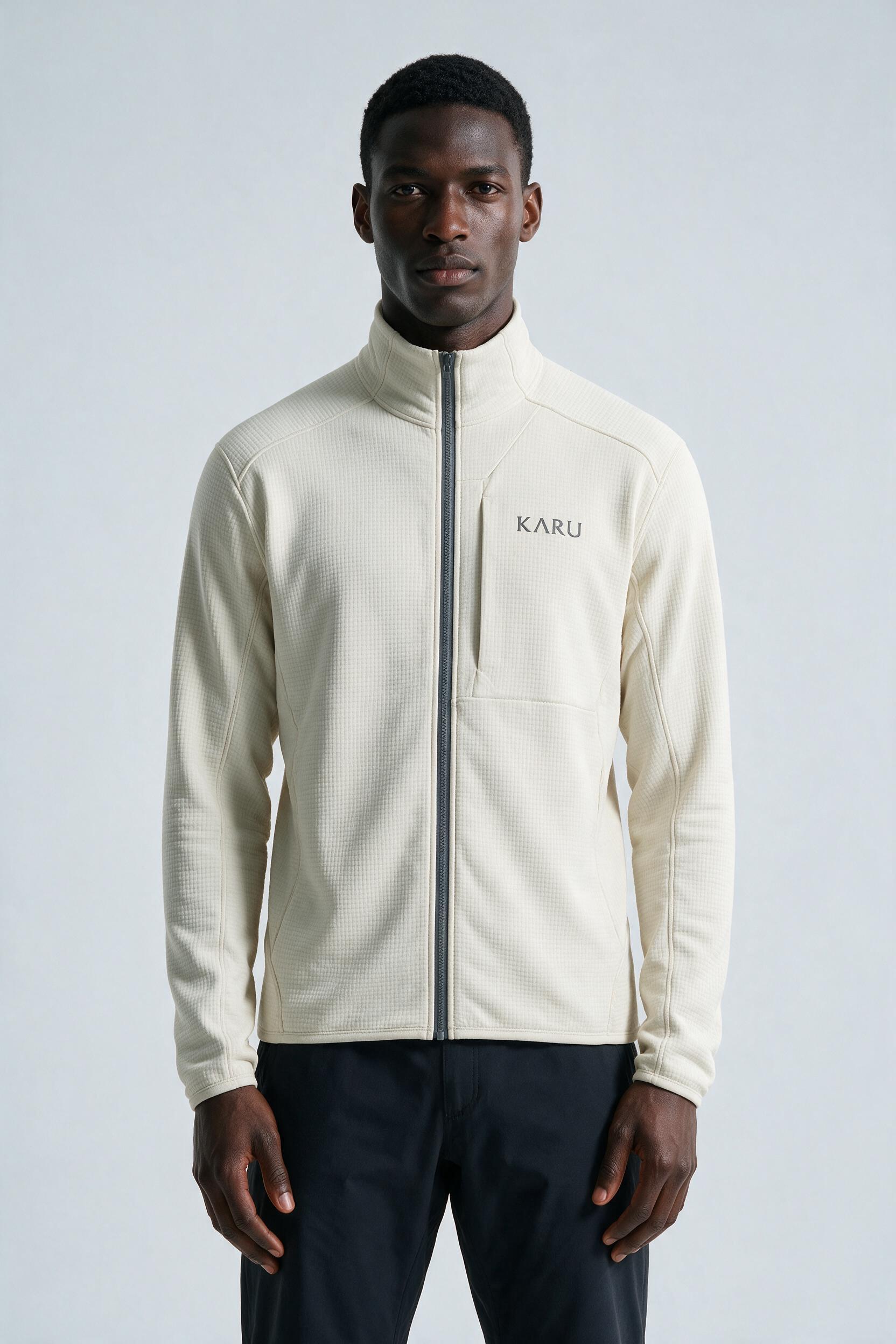 Salto Fleece Ecru in ecru off-white, worn by a model, studio product shot on a seamless neutral ground
