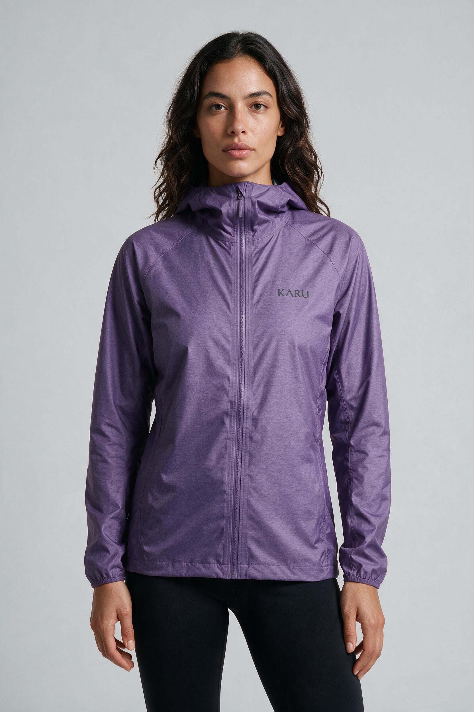 Singi Shell Purple in muted heather purple, worn by a model, studio product shot on a seamless neutral ground