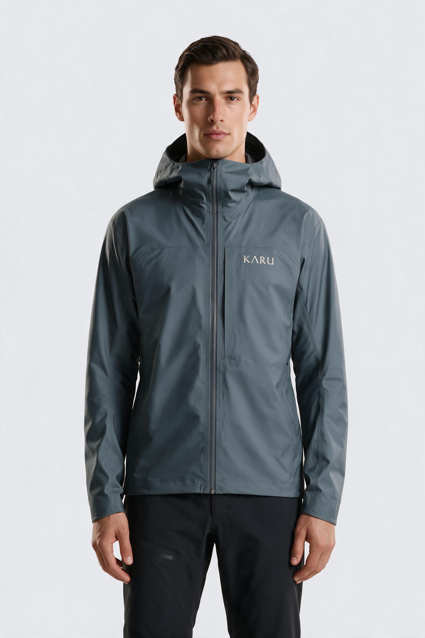 Tarfala Shell jacket in slate, worn by a model, studio product shot on a seamless neutral ground
